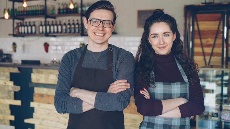 Two small business owners in their shop